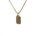 Macro view of a gold-plated square pendant with an H letter on a durable box chain - Letter H
