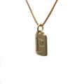 Macro view of gold pendant featuring an engraved capital letter P on a fine box chain - Letter P