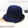 Classic dark blue felt bowler hat featuring a black ribbon bow for women's winter fashion - Navy Blue