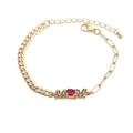 Gold chain bracelet with MOM letters and colorful pavé stones on a clean white background - Mixed Chain + MOM / Gold