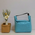 Reusable blue Tyvek insulated lunch bag with black handles and a unique crinkled texture - Sky Blue