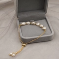 Minimalist adjustable gold chain bracelet with freshwater pearls in a grey velvet jewelry box - Large Baroque Pearl Style