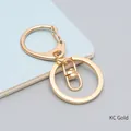 Mousqueton à anneau en D en métal doré KC avec pivot pour accessoires de porte-clés DIY - Or KC