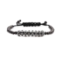 Pulsera tejida ajustable con cuentas negras y dijes de plata con circonitas cúbicas - Color gunmetal