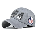 Macro detail of USA embroidery and distressed denim brim on a gray vintage baseball cap - Adjustable / Grey (1964)