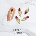 Detail of red teardrop nail gem with gold V-base and 7x16mm sizing on marble background - Gold Red Gem Style (6851)