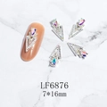Close-up of 3D arrow nail art charms with pear-shaped aurora gems, size 7x16mm - Silver AB Phantom Gem Style (6876)