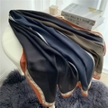 Chic color-block cotton-linen scarf with geometric patterns and H-motif displayed on a table - 180x90cm / Navy Black (YM79-1)