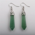 Detail of green hexagonal crystal drop earrings with silver ornate floral caps - Green Aventurine