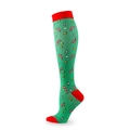 Christmas compression socks in green with candy cane patterns and red heel accents - Green Candy Cane