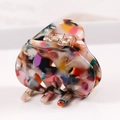 Detailed view of large acetate hair claw clip with colorful marbled pattern finish - S136-12 Bow Colorful Mosaic