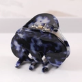 Detail shot of the sturdy gold metal spring and blue marble pattern hair claw clip - S136-11 Bow Blue & White Tie-dye