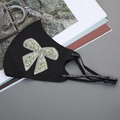Black ice silk face mask featuring a green sparkling rhinestone butterfly design - Bowknot-Green