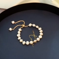 Baroque natural pearl bracelet with 14K gold plated chain and adjustable sliding clasp - White
