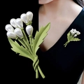 Detailed close-up of a floral brooch with green matte petals and white teardrop pearls - Green Leaf Pearl Bouquet