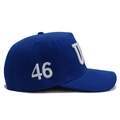 Blue cotton baseball cap with white 46 embroidery detail shown from a 45-degree angle - Blue-USA 46