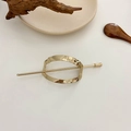 Elegante pasador de pelo geométrico de metal dorado con diseño ovalado para moños - Elipse / Dorado