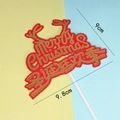 Red and gold Merry Christmas cake topper with reindeer antlers, 9cm wide decoration - Christmas Carnival Toppers