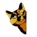 Detailed close-up of a cat door frame topper with faux stained glass patterns - Yellow Cat