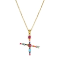 Macro detail of gold cross necklace with vibrant colorful gemstones and fine claw setting - Letter X