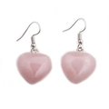Close-up of heart-shaped pink crystal earrings with silver fishhook ear wires - Rose Quartz