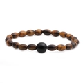 Men's irregular tiger eye stone beaded bracelet featuring a glossy black centerpiece bead - 6*9 Starry Tiger Eye + 10mm Bright Stone
