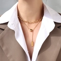 Collana a doppio strato in acciaio al titanio dorato con pendenti a mezzaluna e rettangolari - Collana a doppio strato / Oro