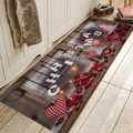 Detailed close-up of a festive Christmas flannel mat with red gift boxes and wooden texture - Letter Heart