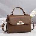 Brown litchi grain leather handbag for women with elegant golden round twist lock - Brown