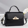 Elegant black lychee leather handbag with gold hardware and adjustable crossbody strap - Black