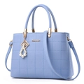 Light blue embroidered tote bag with rhombic stitching, pearl pendant and shoulder strap - Single Bag / Light Blue
