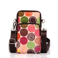 Mini crossbody phone bag with vibrant colorful polka dots and double zipper pockets - Colorful Geometric Dots