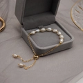 Elegant freshwater pearl gold chain bracelet with baroque style and adjustable slider clasp - Small Baroque Pearl Style