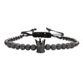Pulsera tejida ajustable con cuentas negras y un dije de corona con circonitas - Corona / Color gunmetal