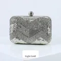 Light gold and silver V-shaped sequined evening clutch bag with round metal clasp - Light gold