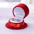 Pink heart crystal stud earrings shown in a red velvet shell-shaped jewelry box - Jujube Red Top Hat