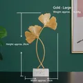 Large golden metal ginkgo leaf ornament with white marble base for home decor - Ginkgo Leaf Large