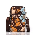 Mini floral crossbody phone bag in dark brown with adjustable shoulder strap and zippers - Brown Floral