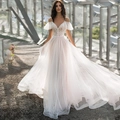 Elegante vestido de novia línea A con encaje y falda de tul brillante - S / Blanco