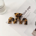Elegant M-shaped hollow acetate hair claw clip featuring classic leopard print pattern - 8.8cm / Coffee Tortoise Shell