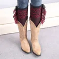 Bohemian knit leg warmers with red tassels and geometric patterns over cowboy boots - Black/Wine Red