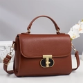 Elegant caramel brown leather crossbody bag with a gold T-shaped lock and floral decor - Khaki/Earth Yellow