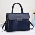 Elegant navy blue pleated handbag with gold buckle and adjustable strap for women - Blue