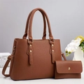 Close-up of brown litchi pattern PU leather tote bag with matching long wallet and gold studs - Khaki/Earth Yellow