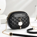 Quilted black crossbody bag with cute cat pendant and elegant gold chain strap - Black