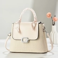 Detail showing beige embossed leather texture, G-letter buckle, and silk scarf handle - White