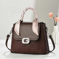 Brown embossed crossbody bag with silver G-buckle and floral silk scarf detail - Coffee