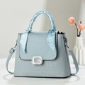Light blue faux leather handbag with geometric texture and silk scarf handle decoration - Light Blue