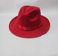 Top view of a bright red wide brim wool fedora hat with matching ribbon for winter style - Red