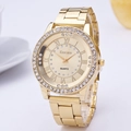 Elegant gold women's quartz watch featuring a sparkling diamond bezel and Roman numerals - Gold